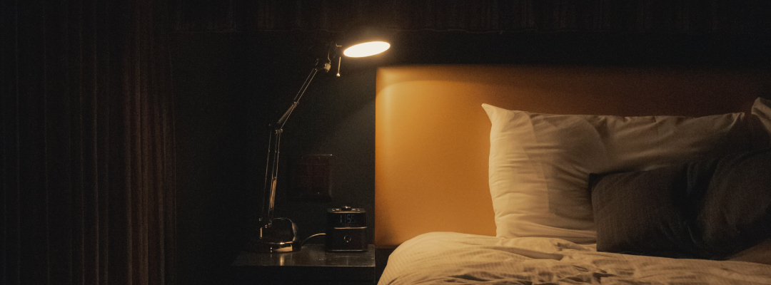 dim light shining on a bed  Apotheka Herbal