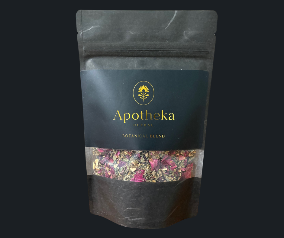 A package of Senuali-tea blend with visible rose petals and other herbs through the transparent window. Apotheka Herbal